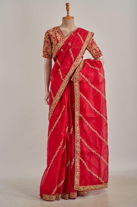 organza dark red saree with stitched blouse
