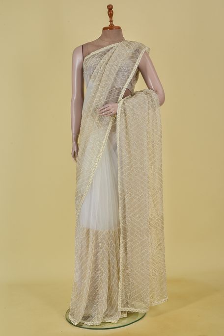 net / tule light beige saree with blouse