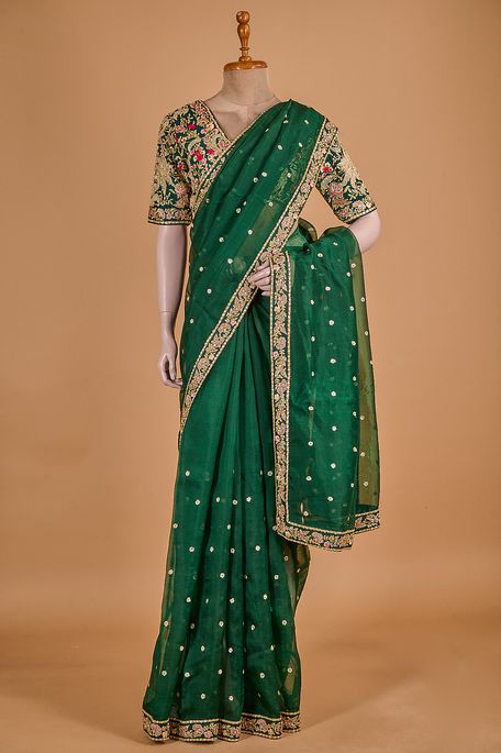 organza dark olive green saree with stitched blouse