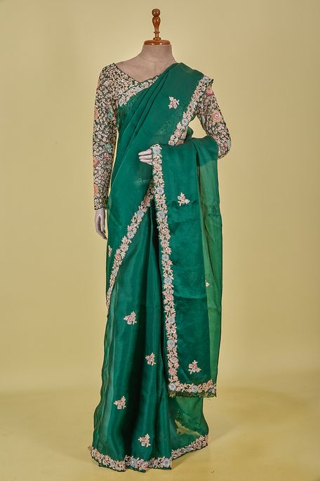 organza satin dark olive green saree with stitched blouse