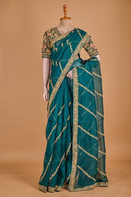 organza dark pine sea green saree with stitched blouse