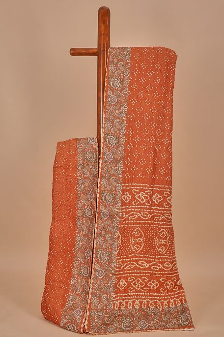 Bandhini tussar terrcotta orange saree with blouse