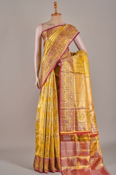 Kanchipuram silk tissue dark mustard saree with blouse