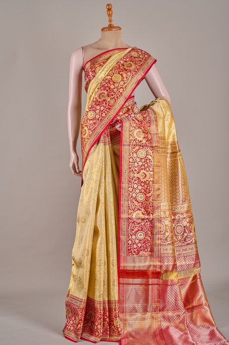 Kanchipuram silk tissue dark cream saree with blouse