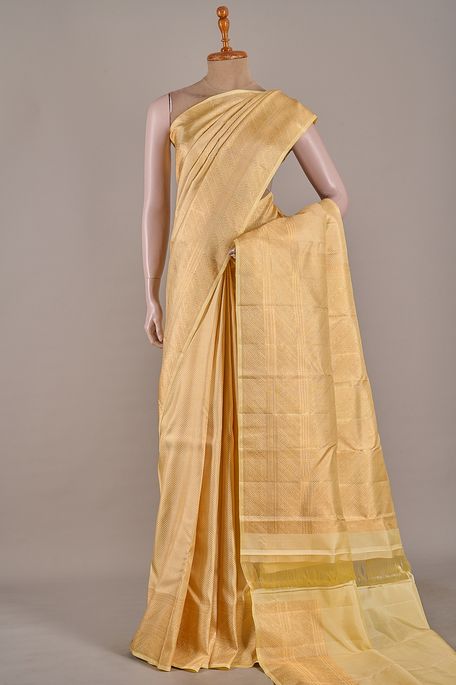 Kanchipuram silk dark cream saree with blouse