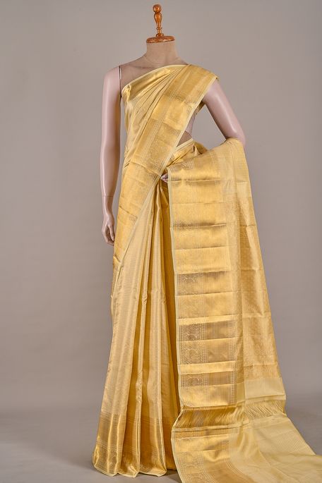 Kanchipuram silk dark cream saree with blouse