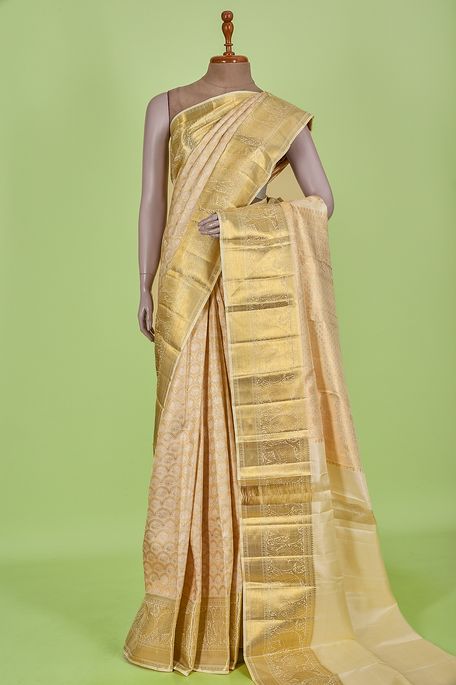 Kanchipuram silk light beige saree with blouse