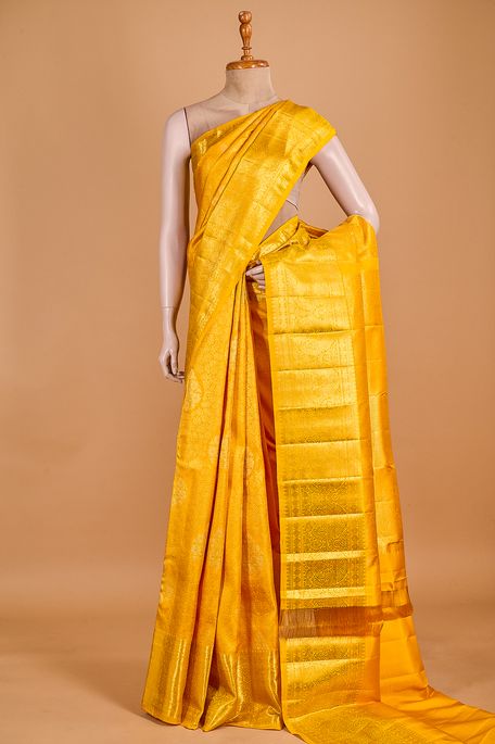 Kanchipuram silk amber yellow saree with blouse