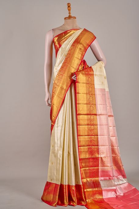 Kanchipuram silk tissue light beige saree with blouse