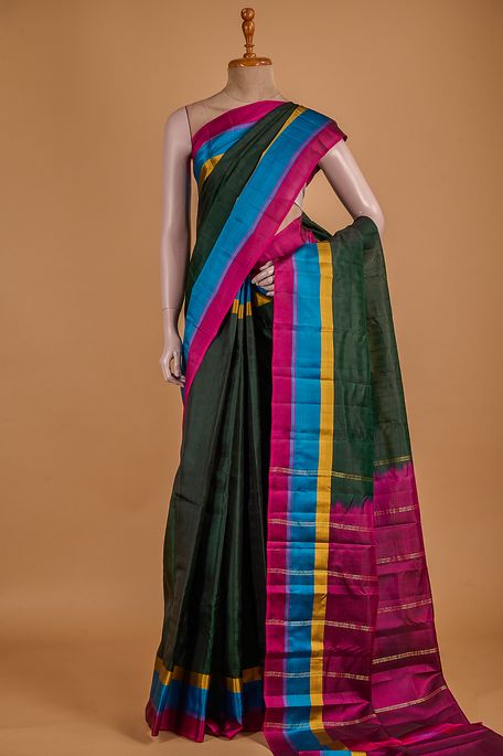 silk dark bottle green saree with blouse