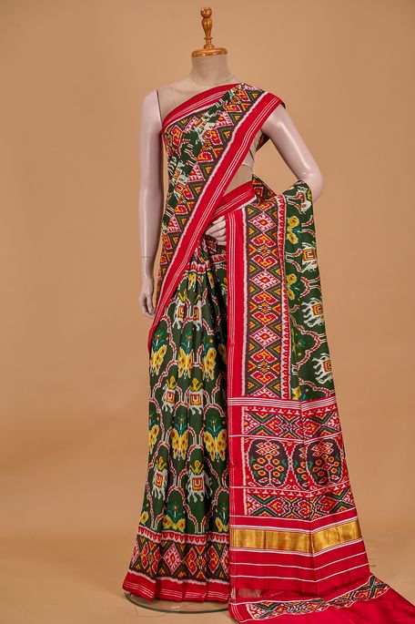 Pathan Patola- silk bottle green saree with blouse
